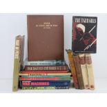A quantity of assorted military themed books inc: 'The Tiger Kills',