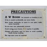 An enamelled tin plate WWII warning sign 'AW bombs fire instantly on breaking in air...