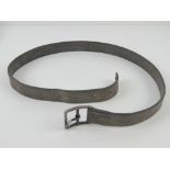 A WWII German or Russian brown leather belt. No legible markings upon.