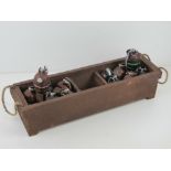 Twelve reproduction inert Mills grenades in transit tray, metal dummies with pins.