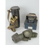 A German gas mask. Together with another gas mask, a/f, in canister.