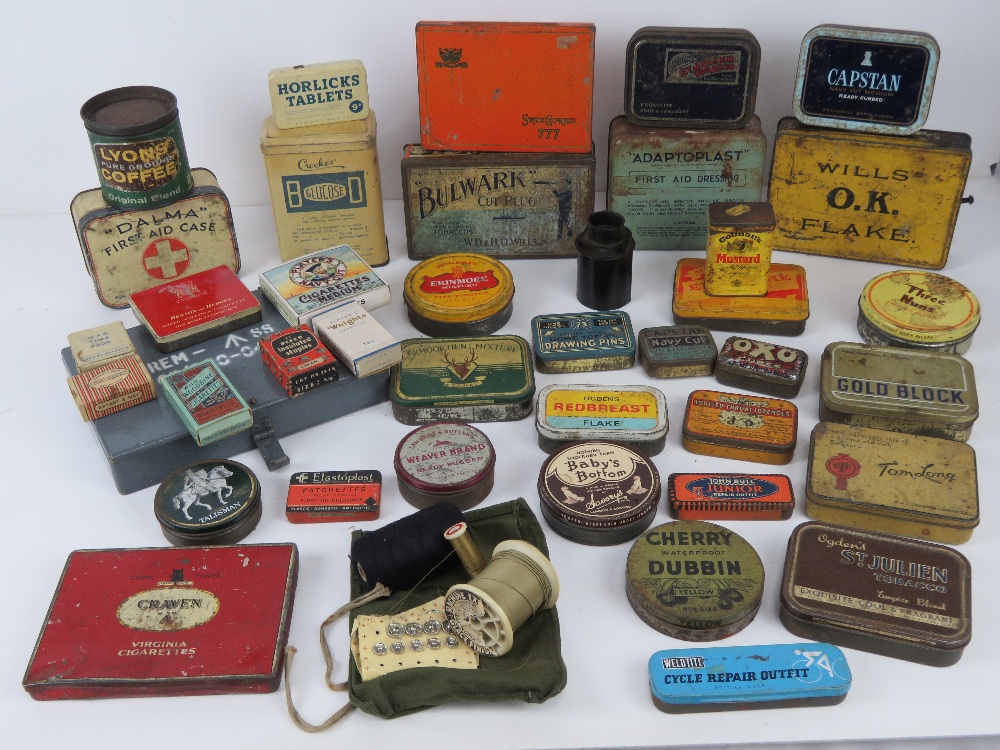 A quantity of circa WWII and later tins inc Odgens St Julian Tobacco, Horlicks tablets,