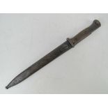 A WWI German K98 bayonet marked for J. A. Henckels, having 25cm blade, with scabbard.