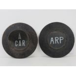 A rare set of WWII light covers being 'ARP' and 'A CAR', each measuring 24.5cm dia.