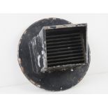 A WWII US headlamp blackout cover for a lorry. 20cm dia.