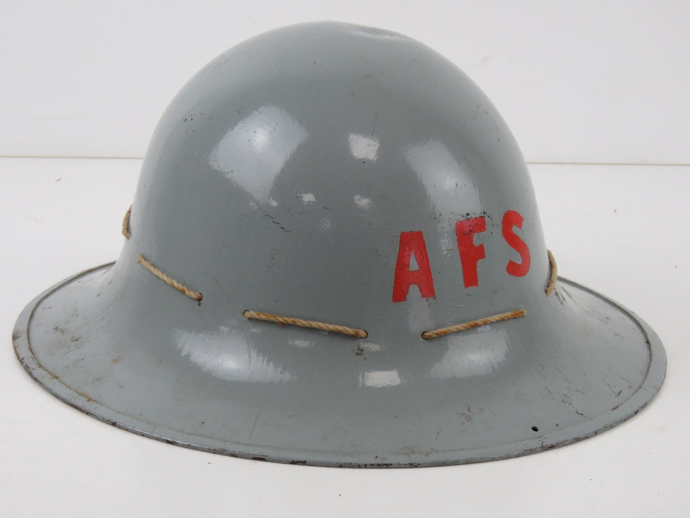 A ladies AFS helmet in grey paint with liner.