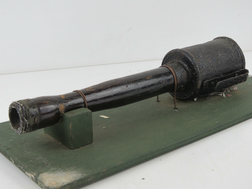 An inert WWI German stick grenade, mounted on board for display purposes, board measuring 42 x 18cm. - Image 2 of 3