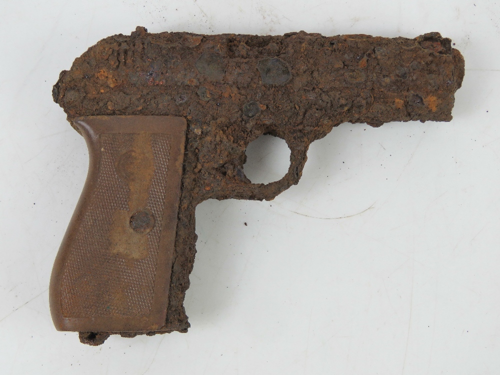 A German Officer's CZ27 pistol in relic condition.