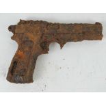A German Browning High Power Pistol in relic condition.