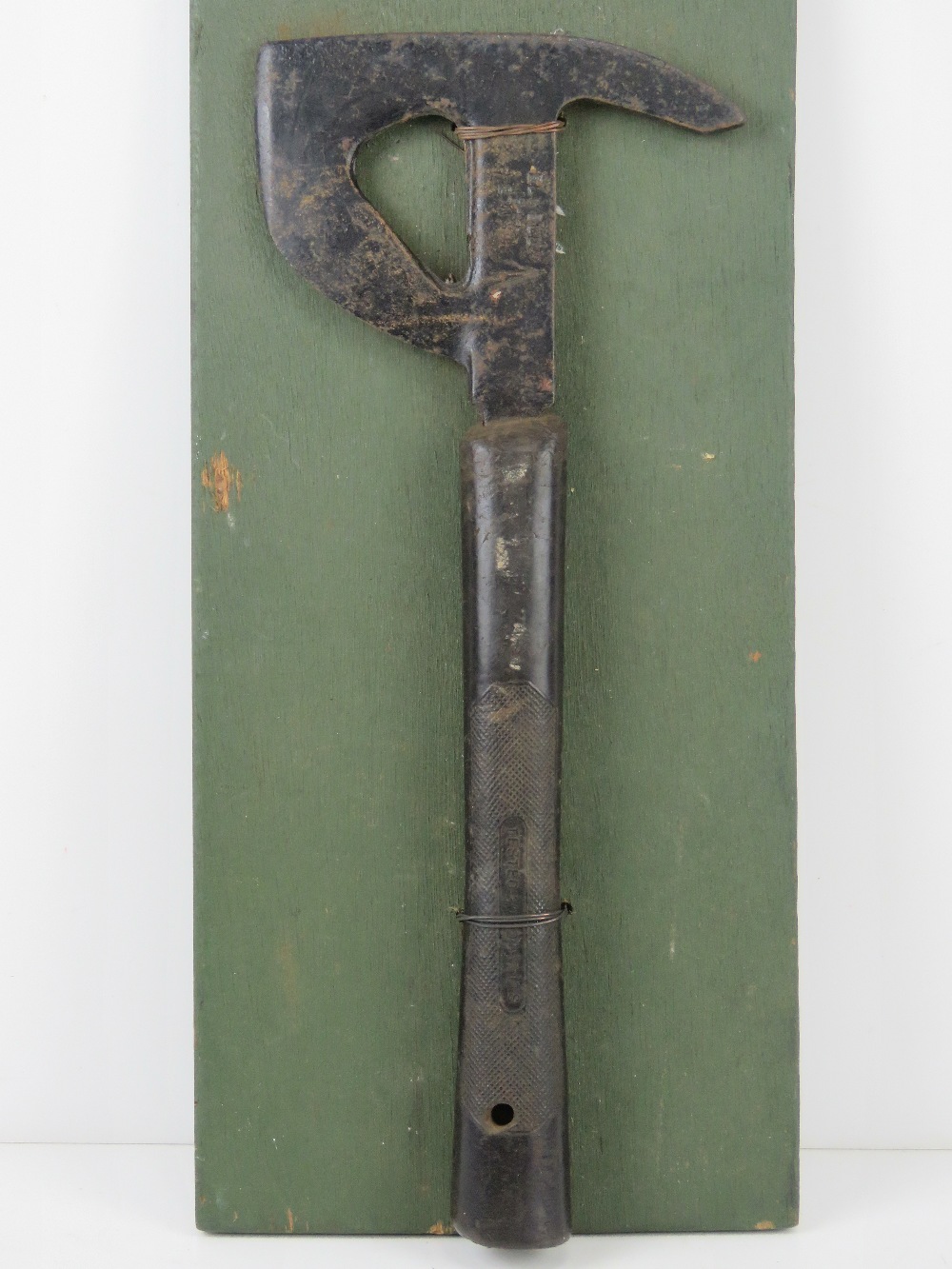 A WWII RAF Lancaster Bomber escape hatchet, having broad arrow upon, marked Elwell and dated 1944.