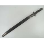 A British 1907 Pattern bayonet bearing R.F.I marks and British stamp to the 42cm blade.
