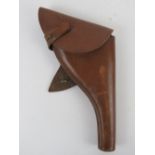 A WWI brown leather holster for the British Webley Mk6, dated 1914 with TJ.