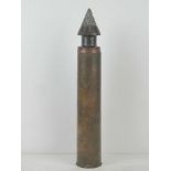 An inert WWII Russian 7.62 T34 Arrow head shell, casing dated 1943 with markings upon.