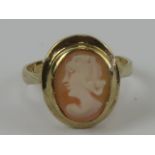 A HM silver and gold plated carved shell cameo ring, hallmarked Birmingham, size N-O.