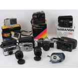A quantity of vintage camera equipment inc two Carl Zeiss Gena DDR lenses, one being 2,4/35,