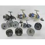 A quantity of assorted fishing reels including; two Motion MT80 reels, a Longbow LB50,