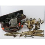 An assorted quantity of vintage Oxycetelen torches and welding items.