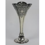 A delightful HM silver bud vase having floral repoussé to the stem and standing 13.