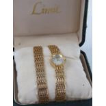 A ladies Limit wristwatch with matching bracelet, in box (slightly a/f box) with paperwork.