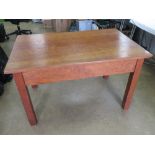 A good solid pine kitchen table raised over square shaped legs, 120 x 76cm, 73cm high.