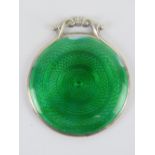 A delightful HM silver and emerald green guilloche enamel mirror, slightly a/f,