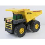 A Tonka dumper truck, plastic and metal, 36cm in length.