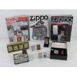 A quantity of Zippo and lighter collectables including; three Zippo manuals in Japanese,