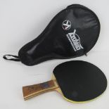 A Yashima K1000 table tennis racket in original case.