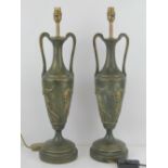 A pair of large classical style table lamps in the form of Grecian urns,