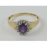 A 9ct gold amethyst and diamond ring,