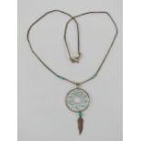 A Native American dream catcher necklace, Navajo style, stamped 925 to the clasp.