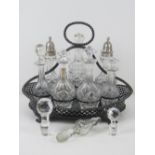 A large silver plated and cut glass cruet set having two cut glass sugar castors with HM silver