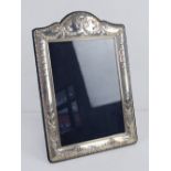 A HM silver photograph frame, 7 x 3 3/4" photo size, having velvet easel back,