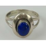 A Native American Navajo style silver ring set with lapis lazuli,