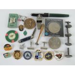 A quantity of assorted badges, coins, cufflinks, etc.