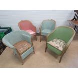 Four Lloyd Loom style painted chairs.