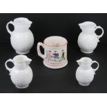 A set of three graduated Coalport Caughley mask-head jugs,