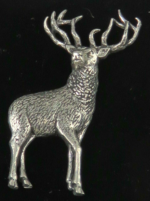 A pewter brooch in the form of a stag by AB Brown, in presentation box.