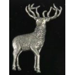 A pewter brooch in the form of a stag by AB Brown, in presentation box.
