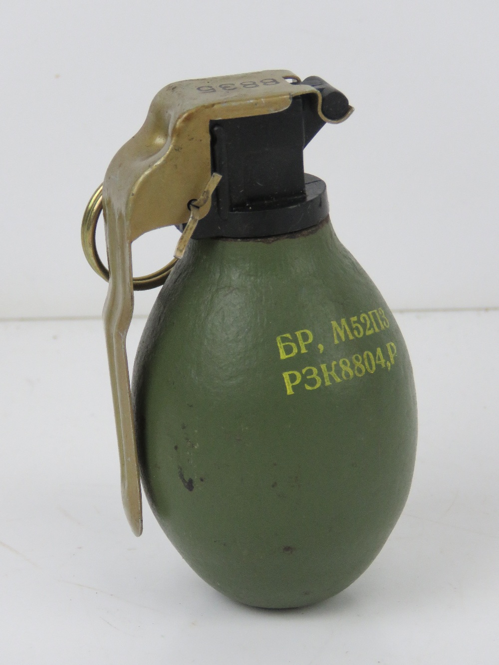 An inert Yugoslavian M52 hand grenade.