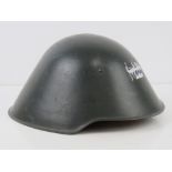 A late 20thC East German helmet marked w