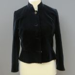 A 1980s jacket of black velvet fabric, b