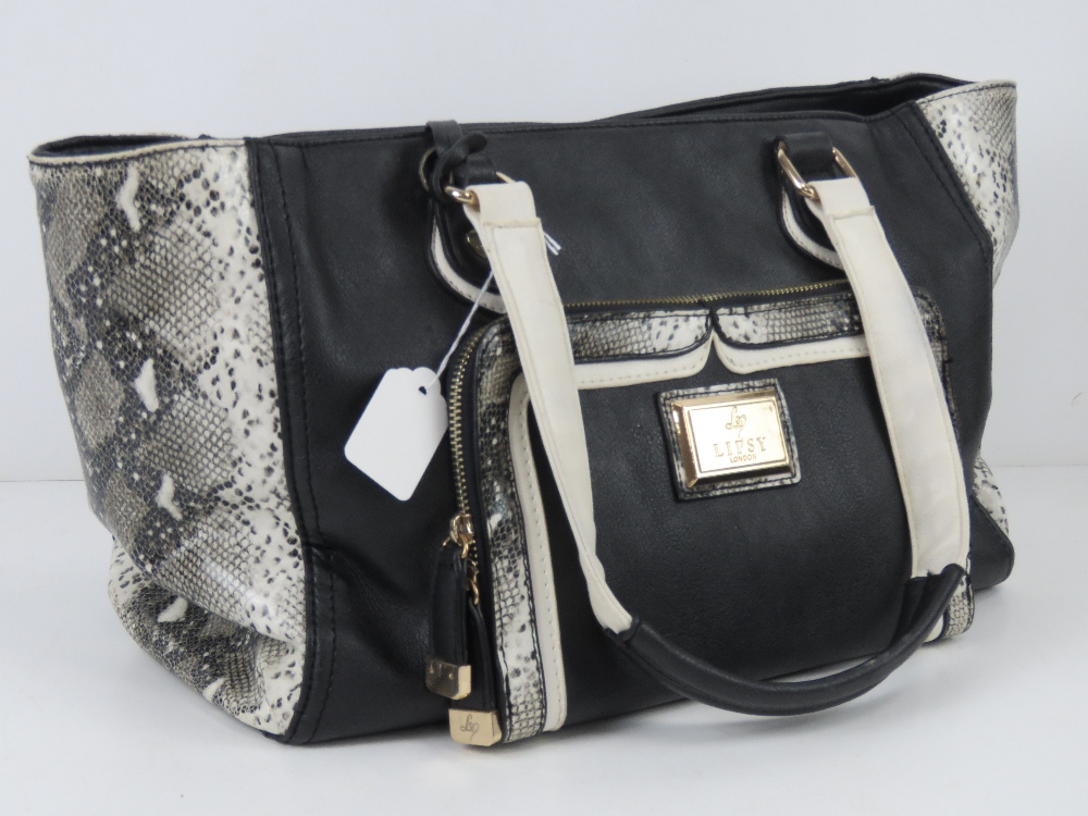 A handbag by Lipsy in black with 'python