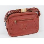 A vintage Italian made handbag in red, m