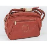 A vintage Italian made handbag in red, m