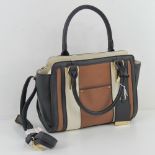 A contemporary handbag in black, brown a