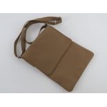 A contemporary leather cross body bag by