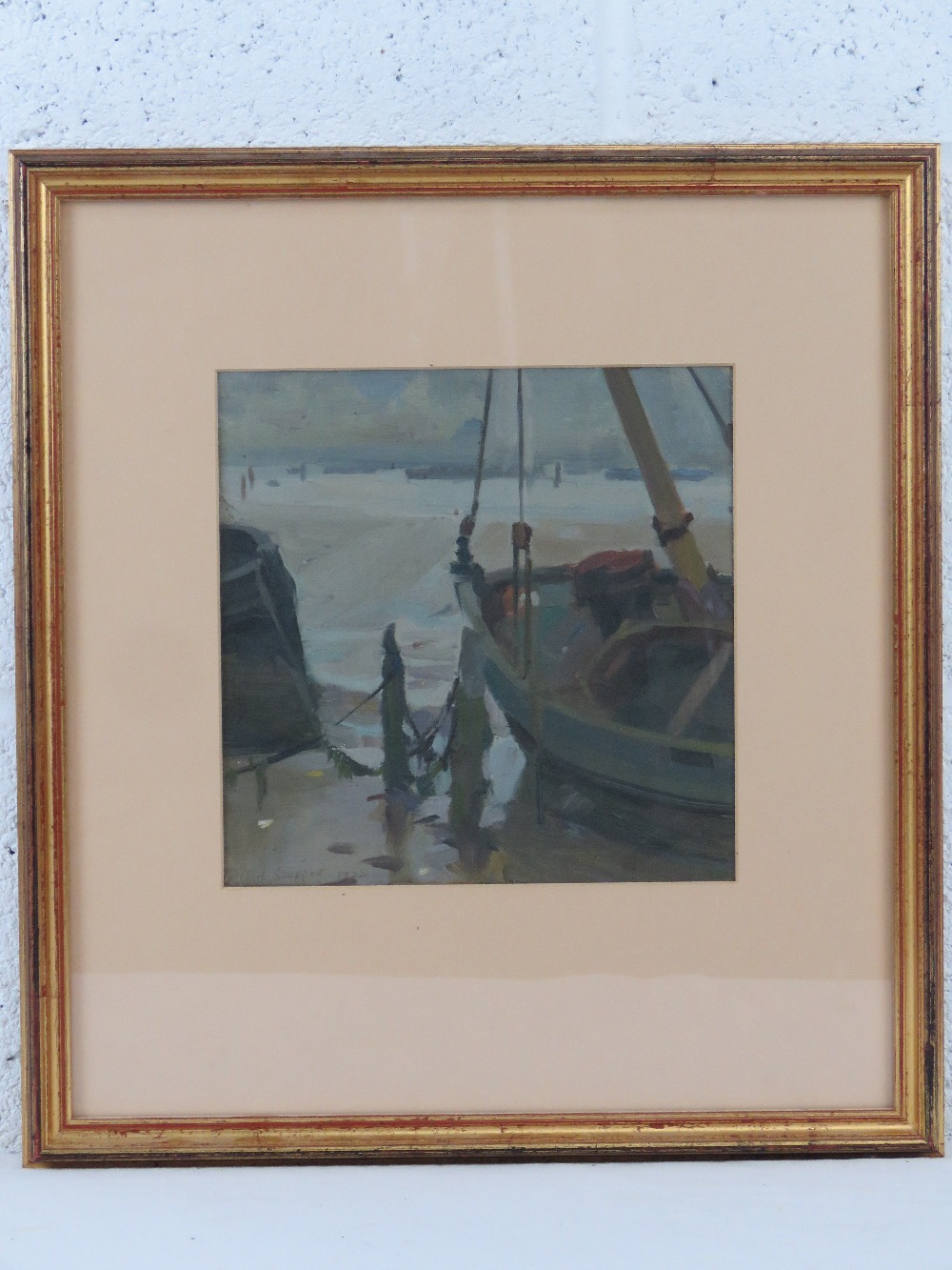 Albert Stafford, oil on canvas under glass, signed and dated 1922, a beached boat at low tide,