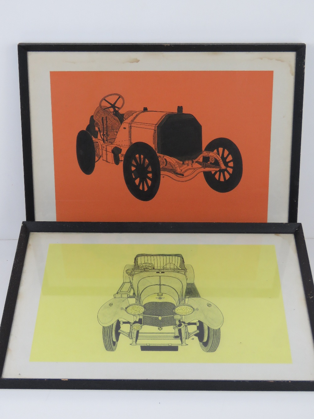 A pair of pen and ink drawings of vintage motor cars, one being a Bentley, each 42 x 30cm, framed
