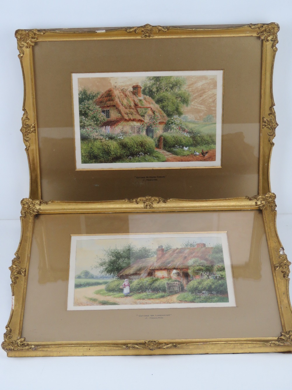 A pair of watercolours by J Hamilton entitled 'Cottage Nr Malpas, Cheshire' and 'Cottage Nr